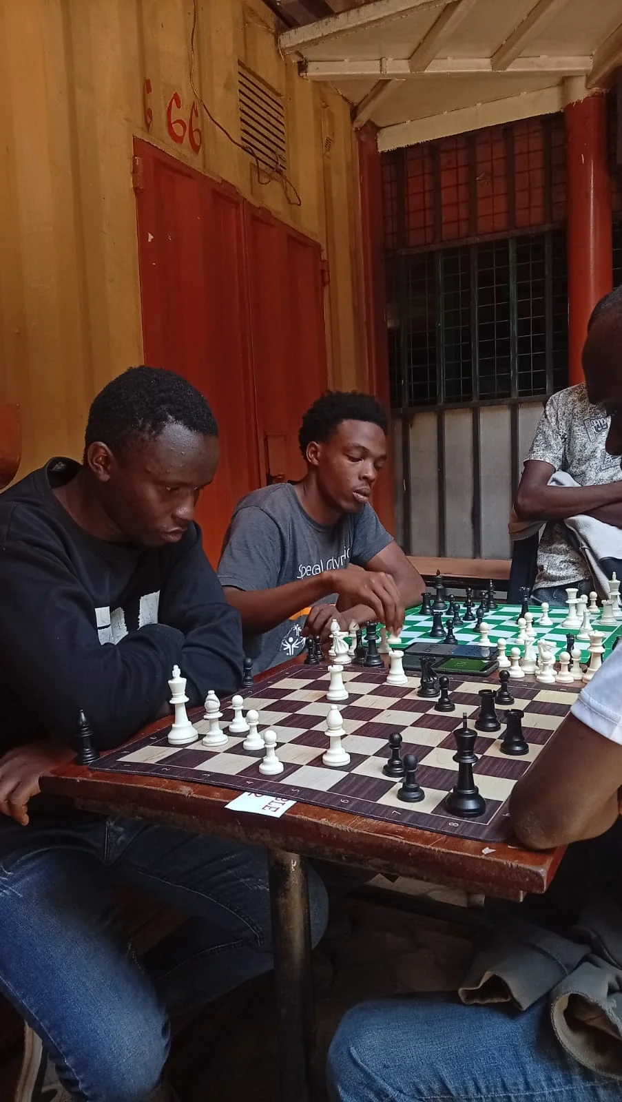 Players concentrating on their games at a Knight Life chess tournament