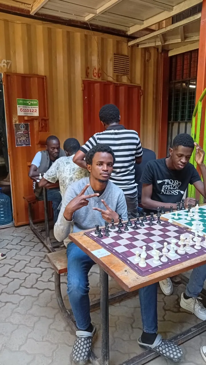Knight Life tournament community gathered at the chess tables